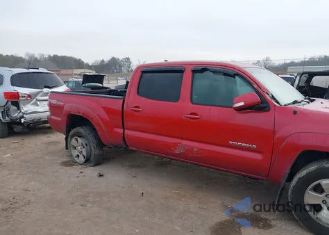 2015 Toyota Tacoma Base V6 z USA, uszkodzony, nr VIN 3TMMU4FN8FM079360